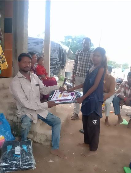 Distribution of notebooks and educational materials to students