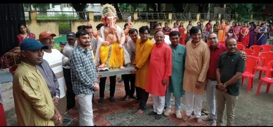 School community and delegates at Rotary English School Ganesh pandal