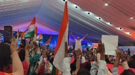 Members holding Viksit Bharat - Welcome PM Narendra Modi banner