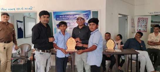 Rotarians interacting with young innovators