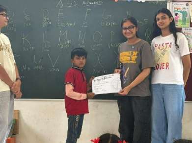 Student receiving certificate for English session