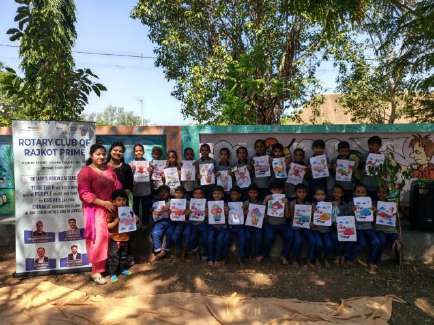 250 students assembled showcasing creative artwork