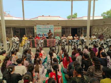 Bicycle handover to school girls