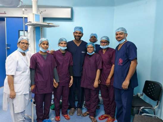 Dr. Maulik Parikh and surgical team in operation theater scrubs