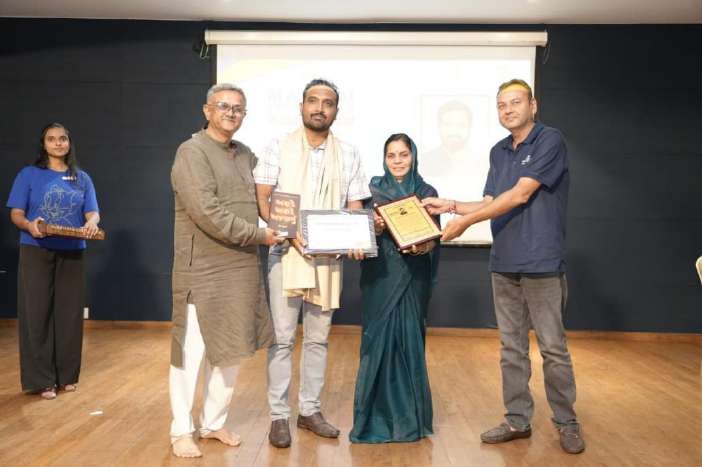 Nation Builder Award presentation on stage