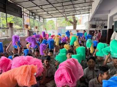 Classroom filled with colorful mosquito nets