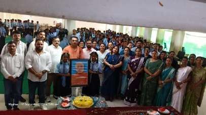 Auditorium packed with school students waiting for eye screening