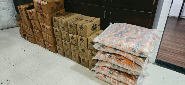 Dry snacks and grocery packages prepared for dispatch