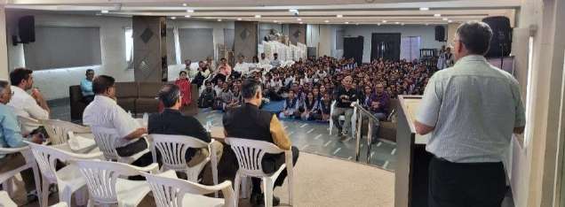 Inauguration address and gathering at school auditorium